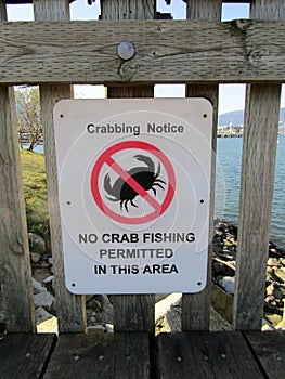 No crab fishing permitted sign