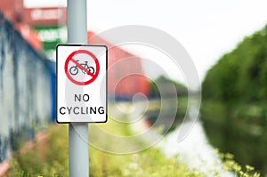 No cycling sign next to canal path