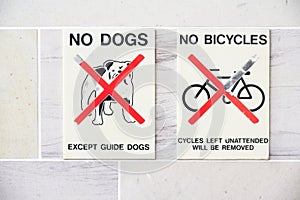 No dogs or bicycles allowed sign at entrance to building