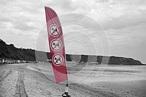 No dogs sail sign on Morfa Nefyn beach in Wales. Part of restrictions for dogs in Wales