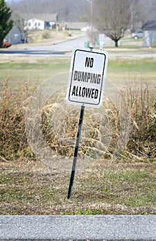 No Dumping Allowed Sign