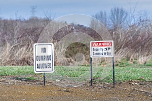 No Dumping Sign and Warning Security Camera In Use Sign