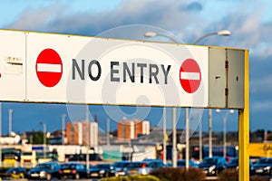 No entry prohibitory sign at parking entrance