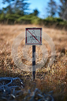 No entry sign along a nature walking path