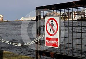 No Entry Warning Sign at an Urban River Estuary Location