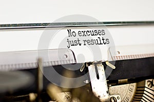 No excuses just results symbol. Concept words No excuses just results typed on retro typewriter. Beautiful white background. No