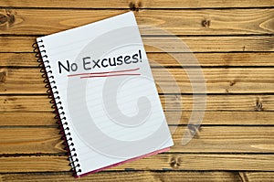 No Excuses word on notebook