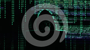 No face hacker with laptop with abstract programming code in the background. Man hacker working on laptop at night. Digital system