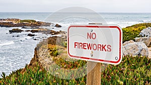 No Fireworks sign posted on the Pacific Ocean coastline, California