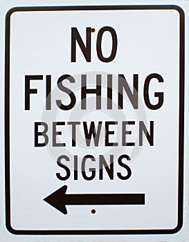No Fishing Between Lines Sign