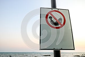 No fishing sign at the beach and copy space