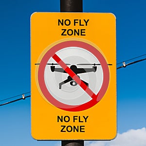 No fly zone sign. No drone zone sign the blue sky background.