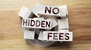 No hidden fees, text written on wooden blocks