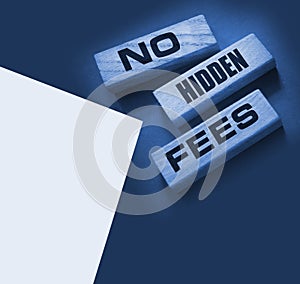 No hidden fees word written on wood block. Taxes and fees. business concept