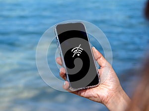 No internet connection technology concept. No signal service at the beach. Wi-Fi network offline sign .