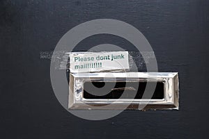 No junk mail precaution on door, London