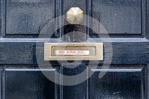 No junk mail precaution on door, London