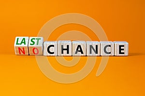 No or last chance symbol. Turned cubes and changed words `no chance` to `last chance`. Beautiful orange background, copy space