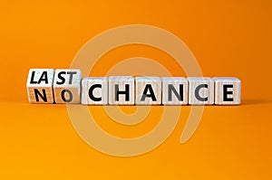 No or last chance symbol. Turned cubes and changed words `no chance` to `last chance`. Beautiful orange background, copy space