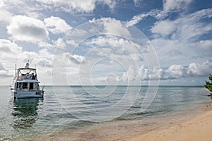 No Man`s land beach Tobago boat clouds sea tropical climate