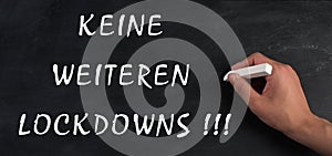 No more lockdowns is standing on a chalkboard, german language, pandimic covid-19 end