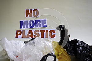 No more plastic message. It shows a plastic with motto and selective focus no more plastic text