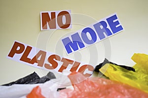 No more plastic message. It shows a plastic with motto and selective focus no more plastic text