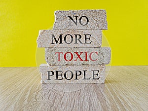 No more toxic people symbol. Concept words No more toxic people on brick blocks