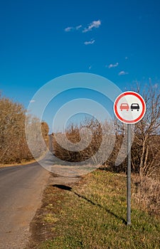 no overtaking sign on a road section
