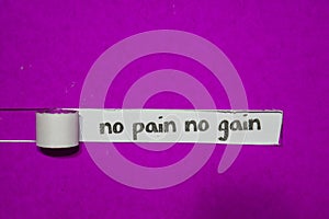 No Pain No Gain, Inspiration, Motivation and business concept on purple torn paper