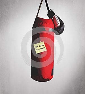 No pain no gain on punching bag