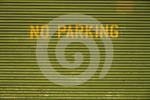 No Parking Block Letters On Top of Garage Door