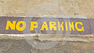 No Parking painted asphalt
