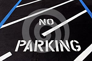 No Parking Painted on Diagonal Parking Lot