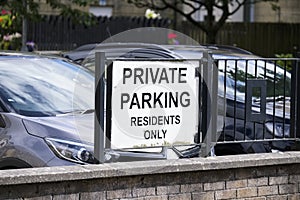 No parking private property residents car park sign