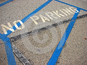 No parking sign on pavement