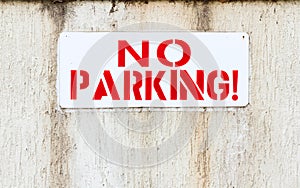 No parking sign. Private zone. Please do not leave you car here. Road up. Do not enter. Road signs. Red letters.