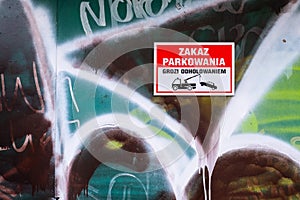 No parking sign and towing warning pictogram in Polish language