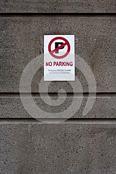 No Parking - Violators will be towed at owner`s Expense