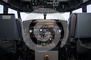 No people in empty plane cockpit with dashboard command