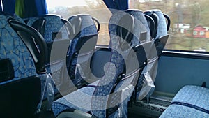 No people inside a low budget bus, empty seats, off-season. Economy class travel