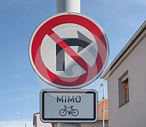 No right turn except bikes sign photo