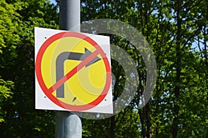 No right turn - road sign. Prohibiting traffic sign on a background of nature. Yellow