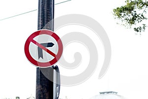 No right turn traffic sign. Traffic warning sign hanging on the pole