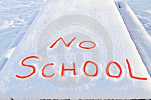 No School, two words outlined in snow