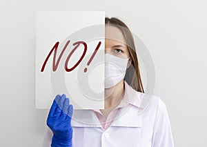 No sign word in doctor hands. Negative answer concept. No risk, no illness, no virus
