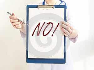 No sign word in doctor hands. Negative answer concept. No risk, no illness, no virus