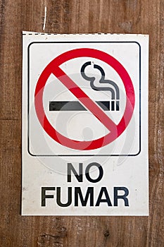 No smokin sign with spanish text photo