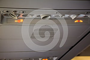 No Smoking and Fasten Seatbelt sign Inside an airplane