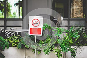 No smoking sign , open air zone of  restaurant